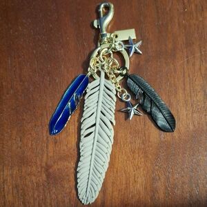 Feather and Star Bag Charm with Gold Star Accents